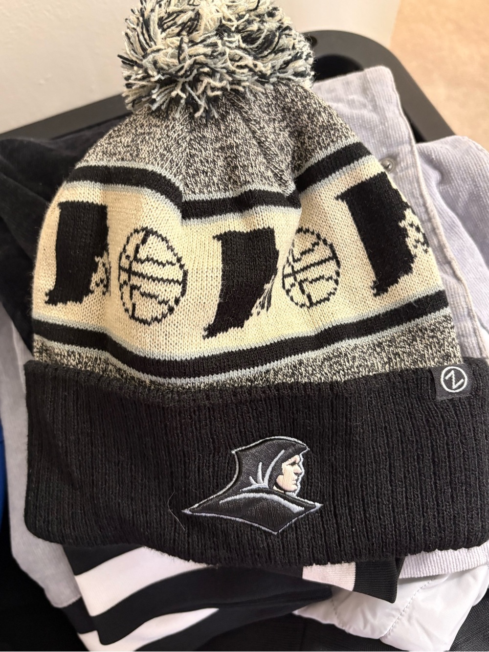 Zephyr Black and Cream Basketball Pom Beanie